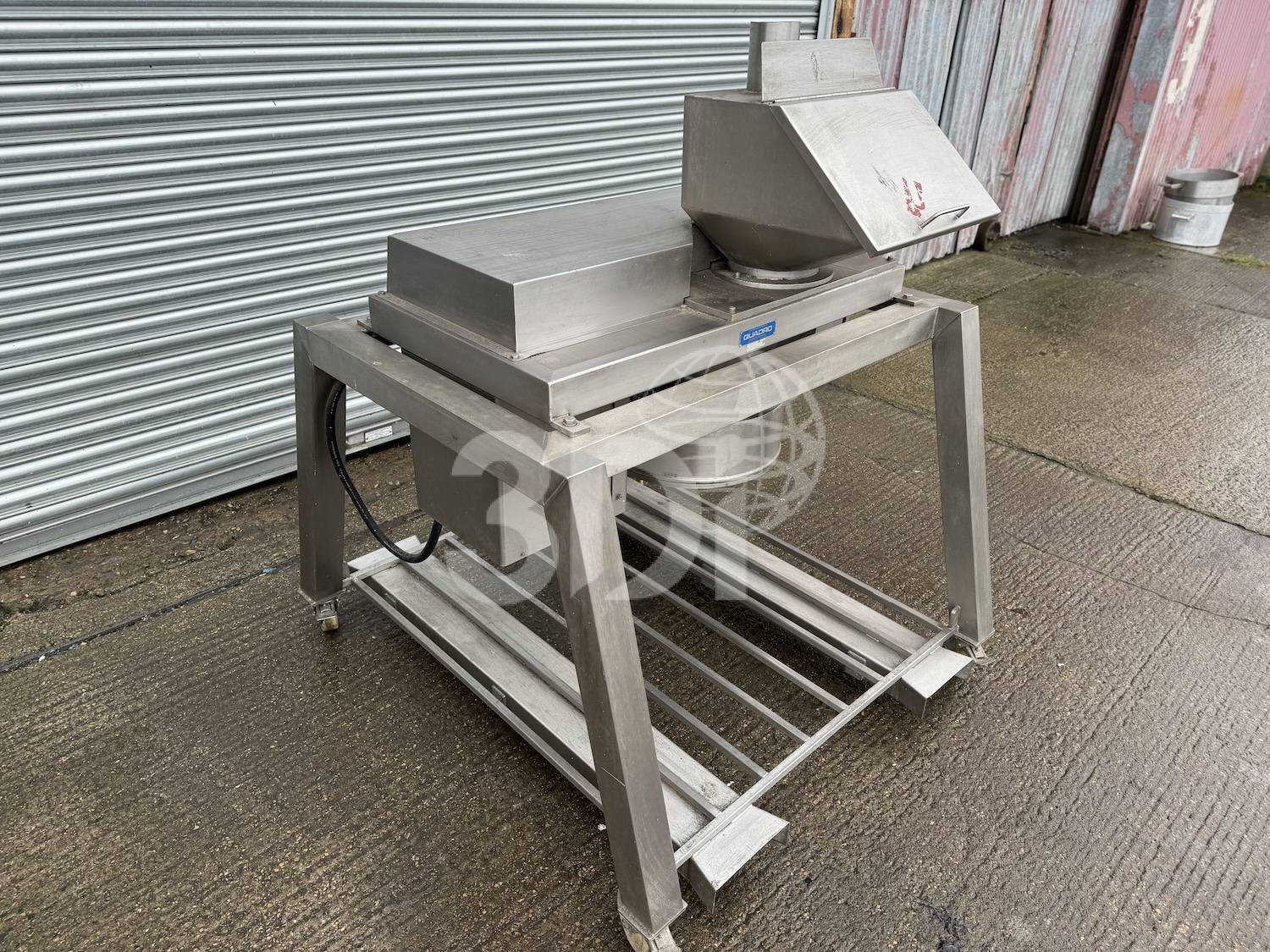 left side image of a quadro comil 196s cone mill
