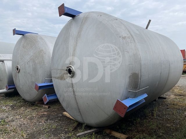 image of the base of two 30000 litre stainless steel storage tanks