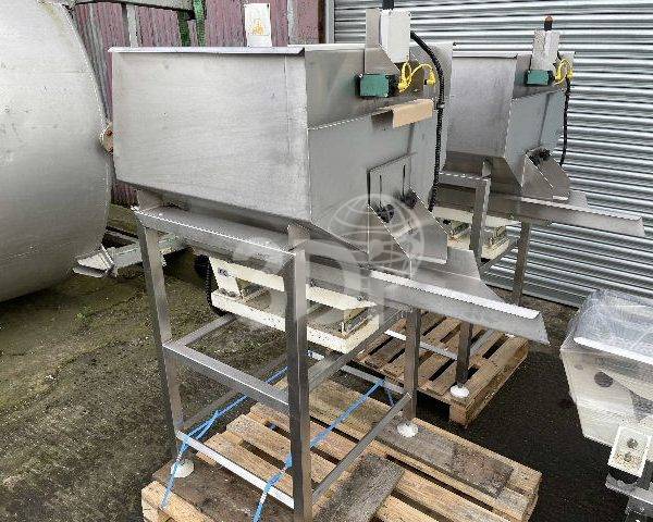side image of two used podmores infeed hoppers