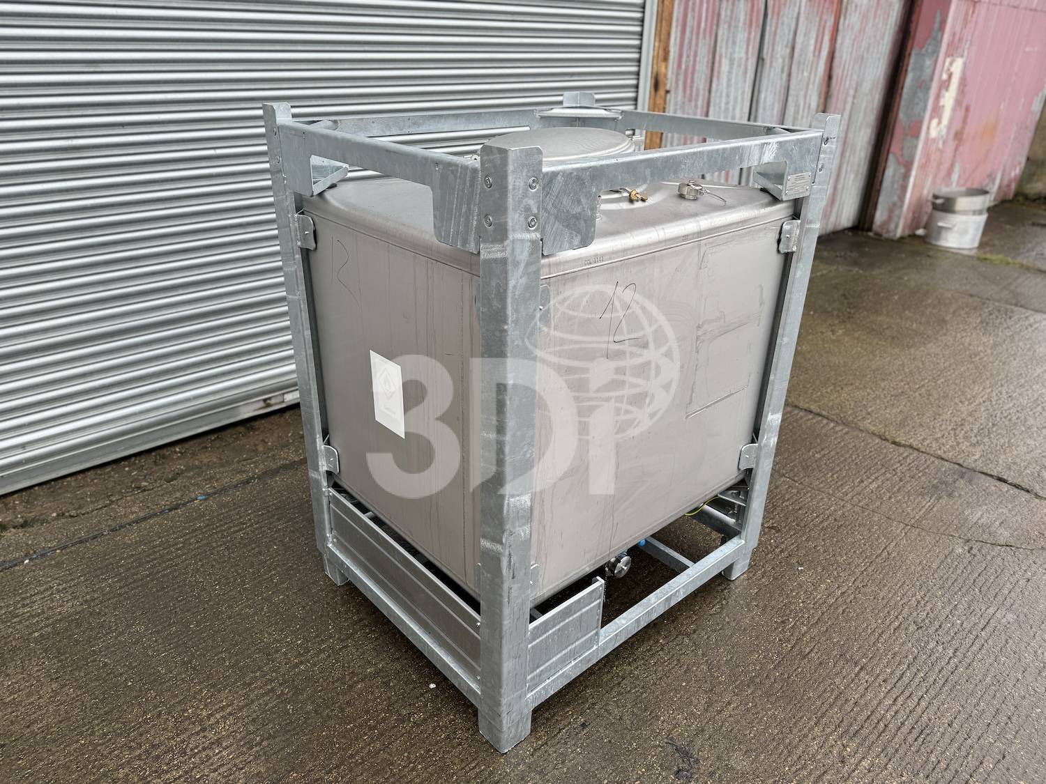 side image of a 1000 litre schafer-sudex stainless steel ibc stock 2876