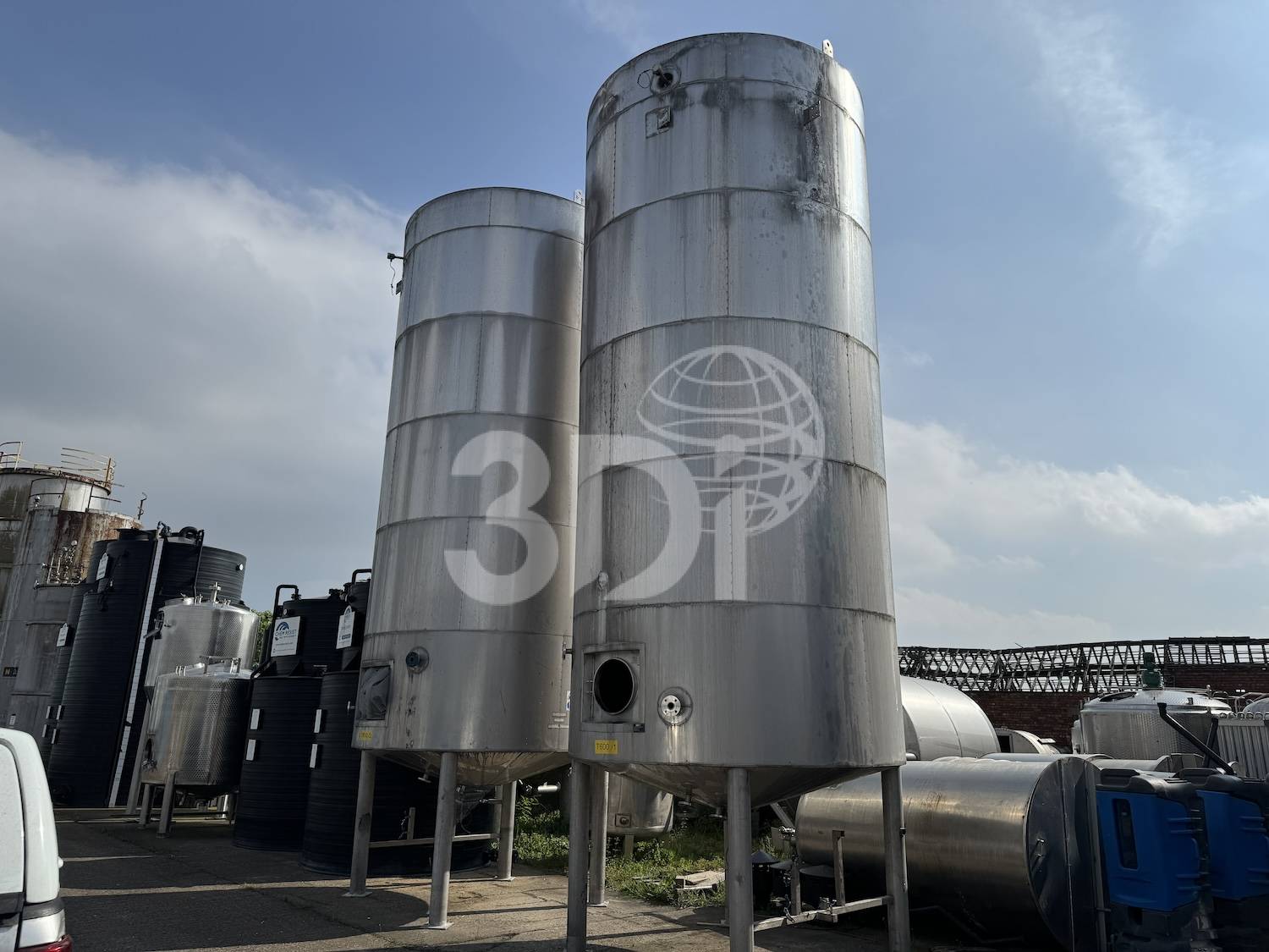near side image of two 38500 litre jacketed stainless storage tanks