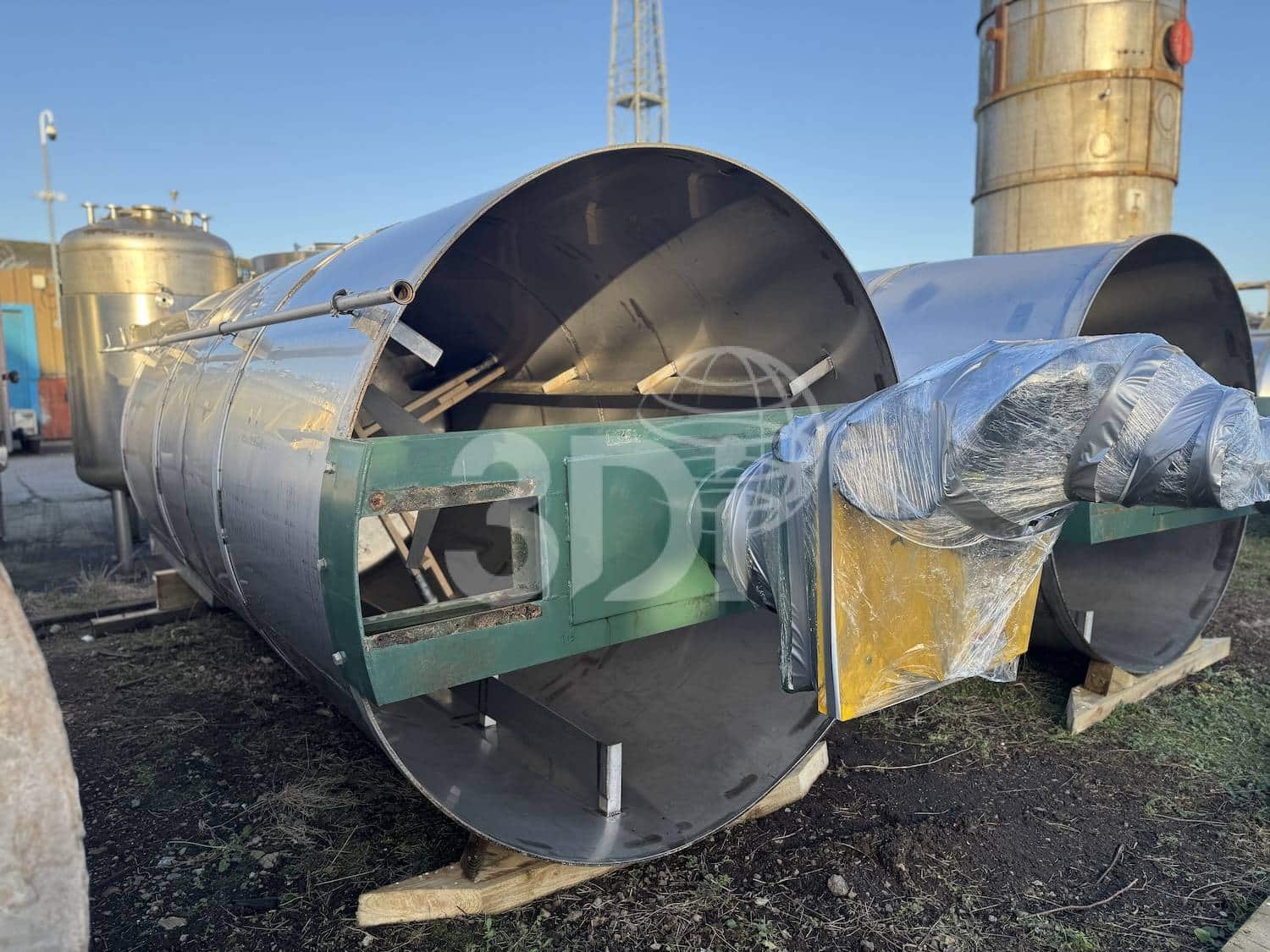 side image of a used 12000 litre stainless steel mixing tanks