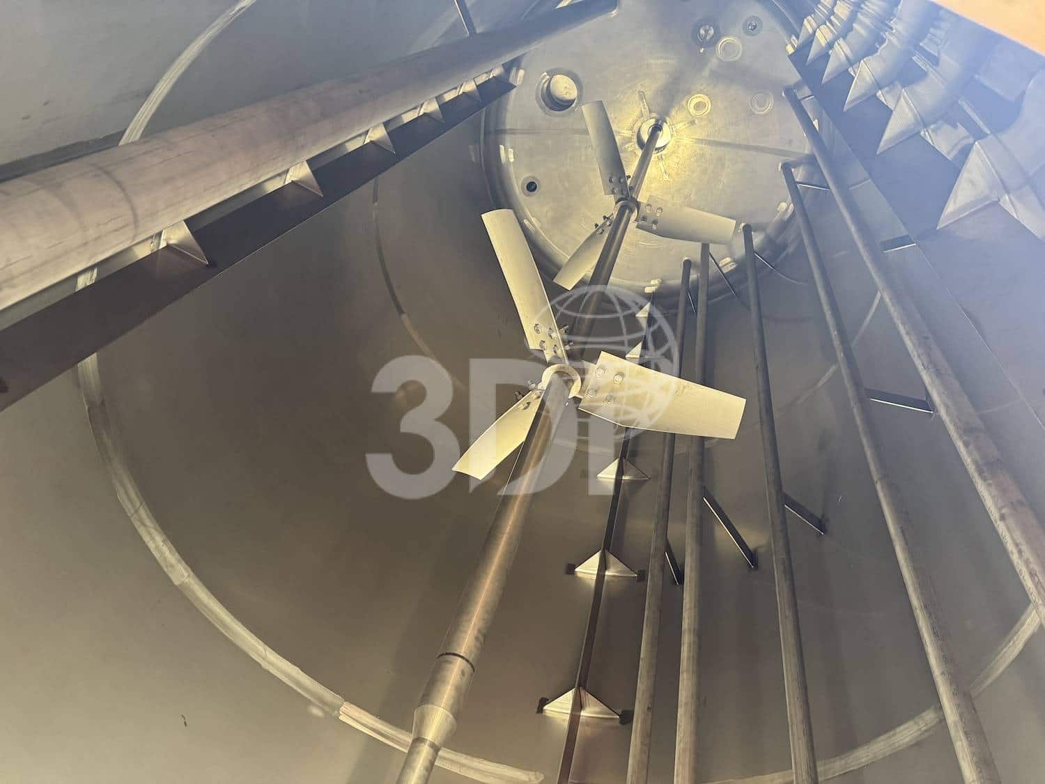 internal image of a unused 32400 litre stainless steel mixing vessel